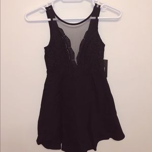 Black a-line dress with sheer detailing